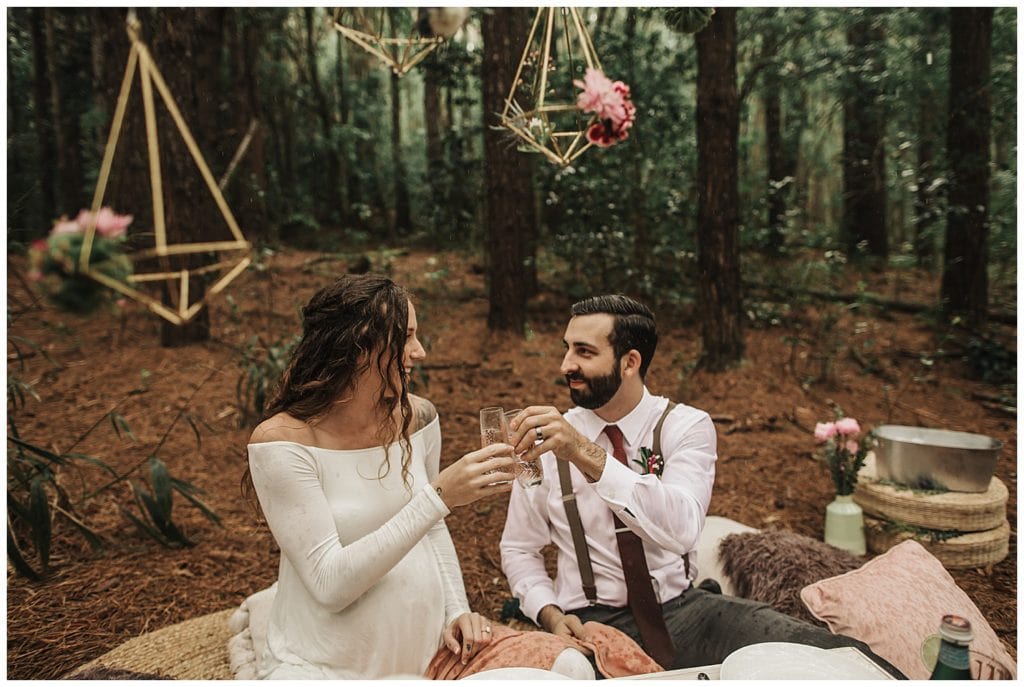 Boho wedding in Hawaii maui, couple kissing and walking and getting married