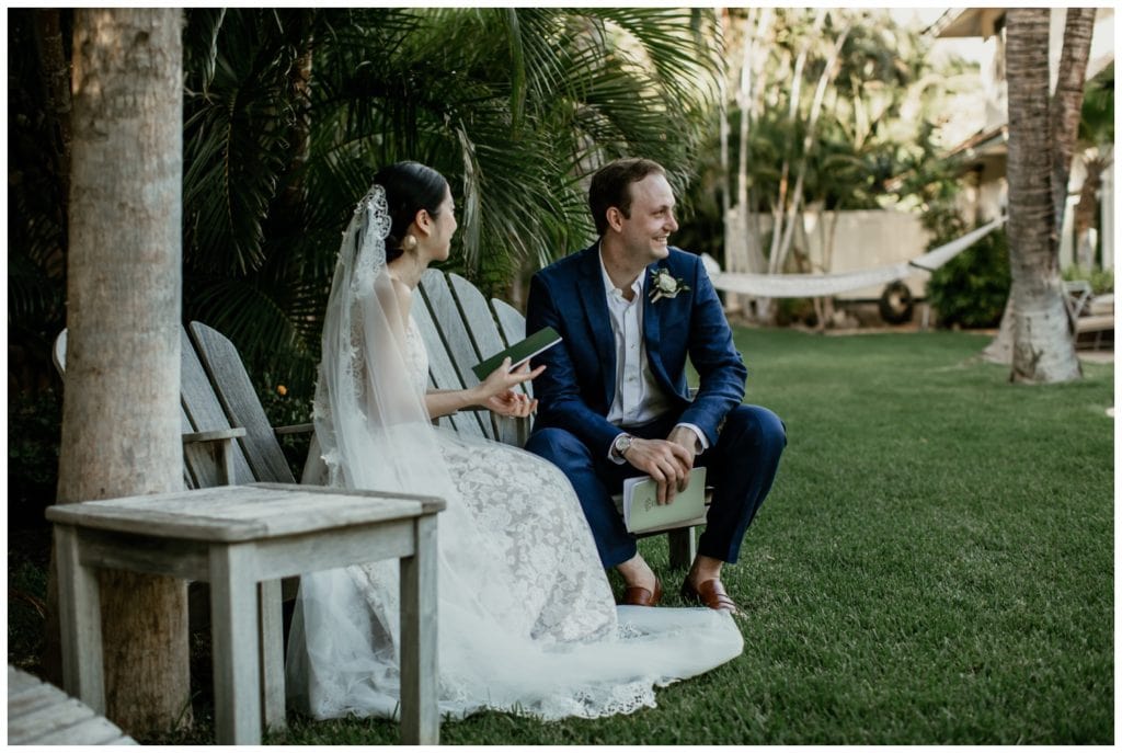 Olowalu Wedding Elopement Photographer picture of bride and groom reading vows to each other