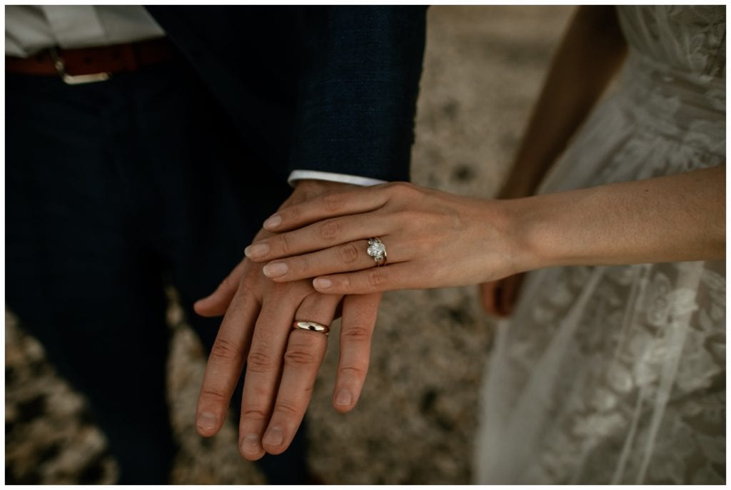 Olowalu Wedding Elopement Photographer picture of bride and groom on their wedding day holding hands wedding rings