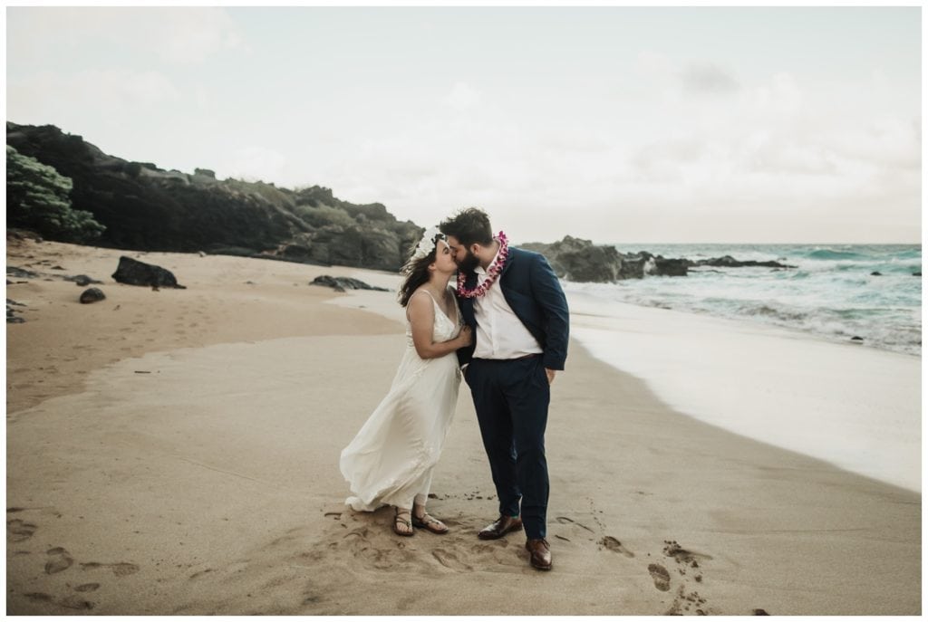 Hawaii Elopement on the beach Photographer Amy Jayne captured couple getting married on the beach