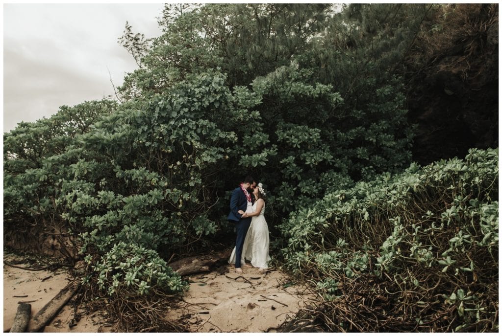 Hawaii Elopement on the beach Photographer Amy Jayne captured couple getting married on the beach