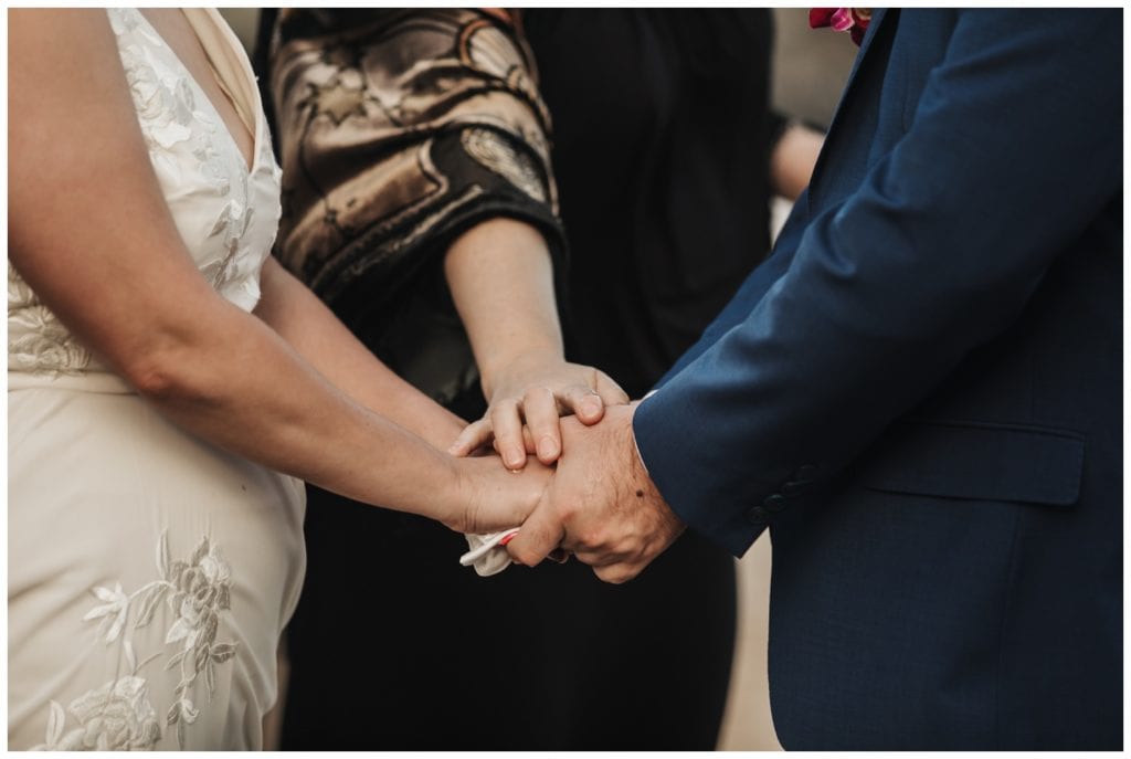 Hawaii Elopement on the beach Photographer Amy Jayne captured couple getting married on the beach