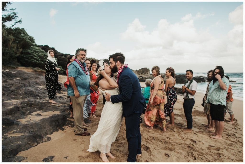 Hawaii Elopement on the beach Photographer Amy Jayne captured couple getting married on the beach