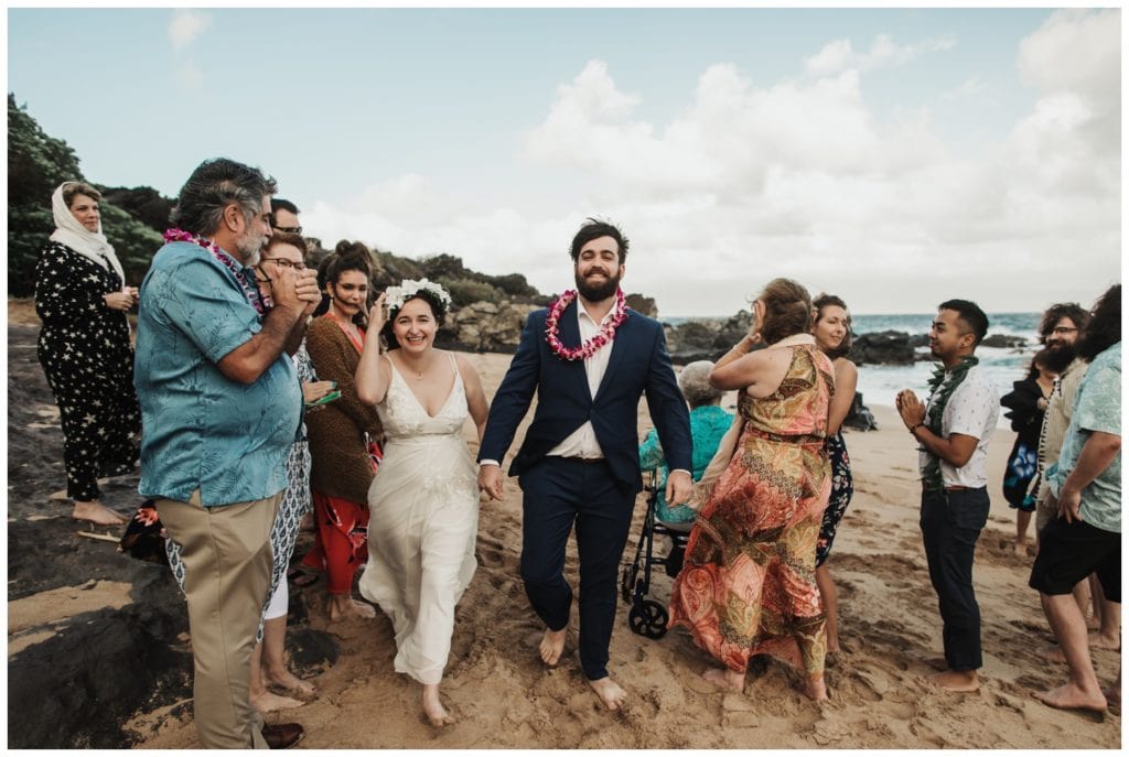 Hawaii Elopement on the beach Photographer Amy Jayne captured couple getting married on the beach
