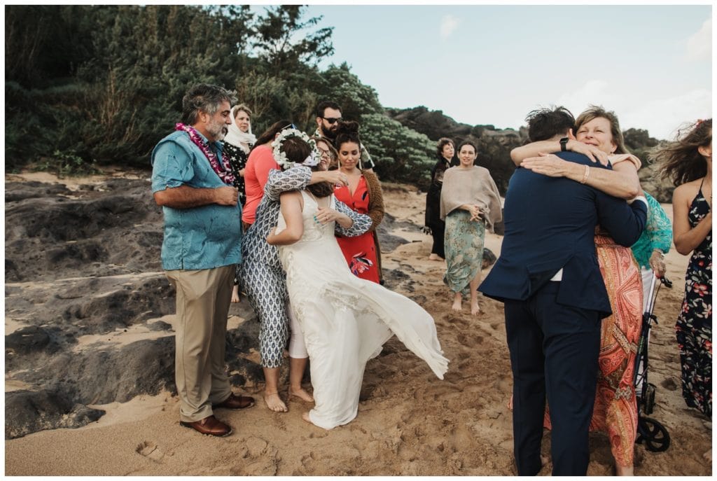Hawaii Elopement on the beach Photographer Amy Jayne captured couple getting married on the beach