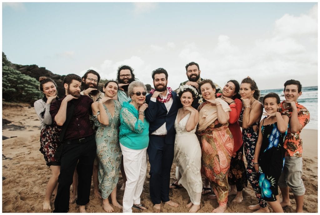 Hawaii Elopement on the beach Photographer Amy Jayne captured couple getting married on the beach