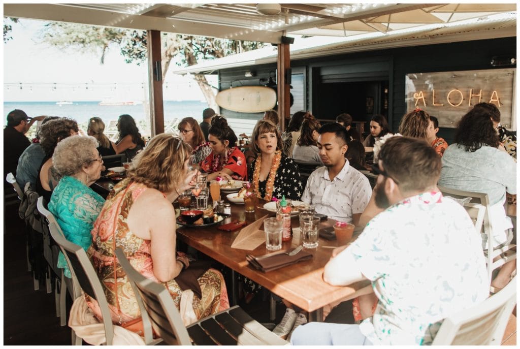 Hawaii Elopement on the beach Photographer Amy Jayne captured couple getting married and reception at a restaurant in Lahaina