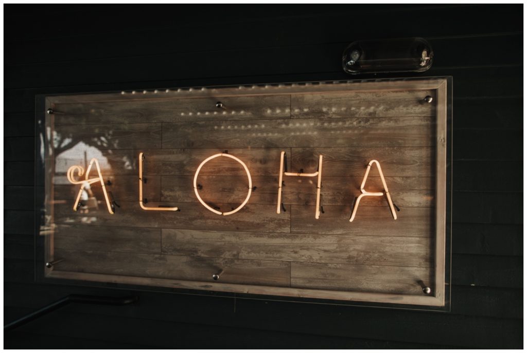 Hawaii Elopement on the beach Photographer Amy Jayne captured couple getting married and reception at a restaurant in Lahaina