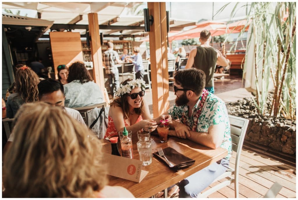 Hawaii Elopement on the beach Photographer Amy Jayne captured couple getting married and reception at a restaurant in Lahaina