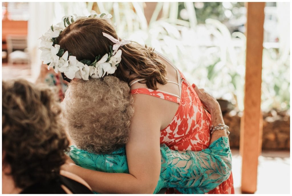 Hawaii Elopement on the beach Photographer Amy Jayne captured couple getting married and reception at a restaurant in Lahaina