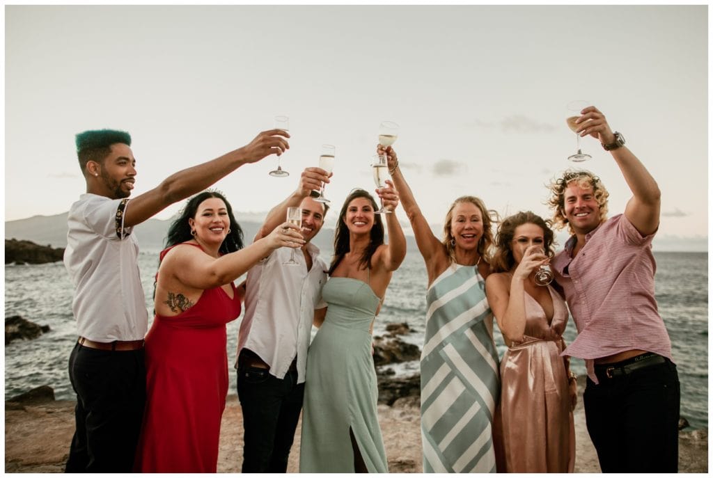 Maui proposal photographer Amy Jayne Photography captured this surprise proposal in Kapalua Maui on the cliffs with the couple on the beach