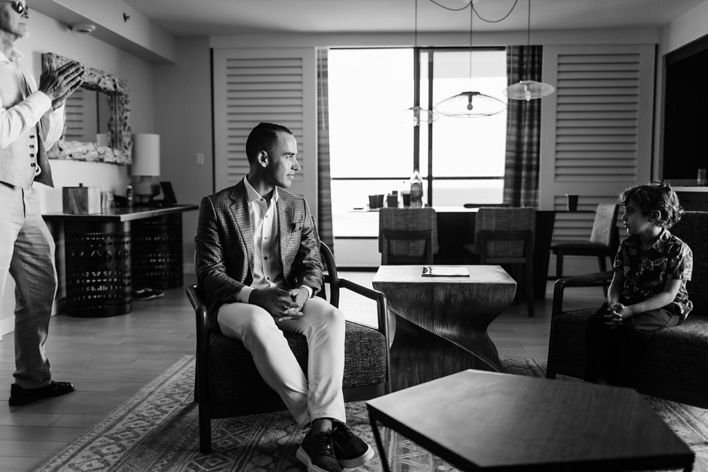 B&W Groom sitting in getting ready room before Ceremony