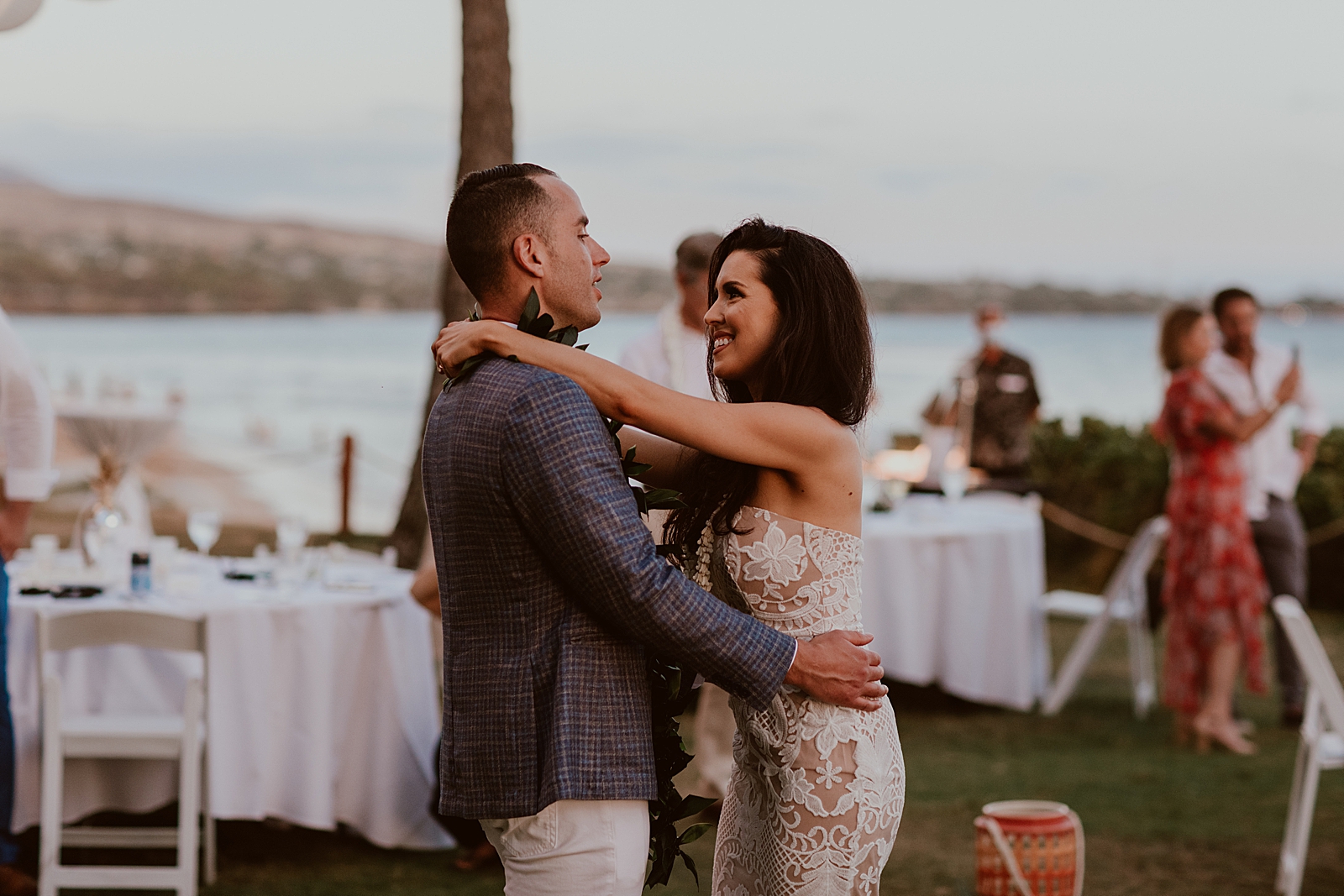 Bride and Groom slow dancing together for outdoor Reception