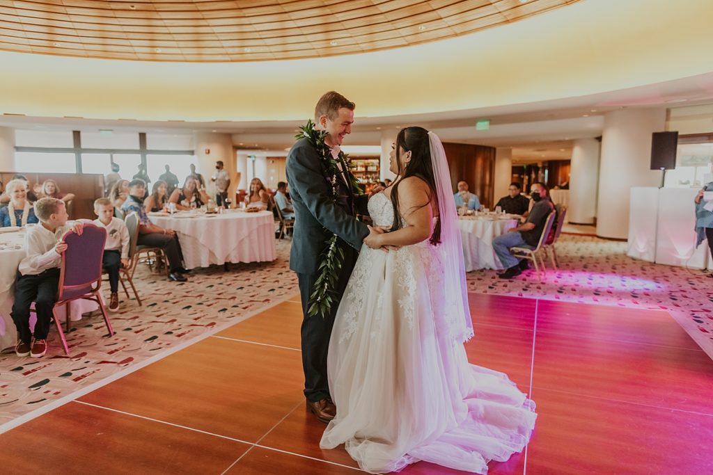 Bride and Groom holding each other for First dance