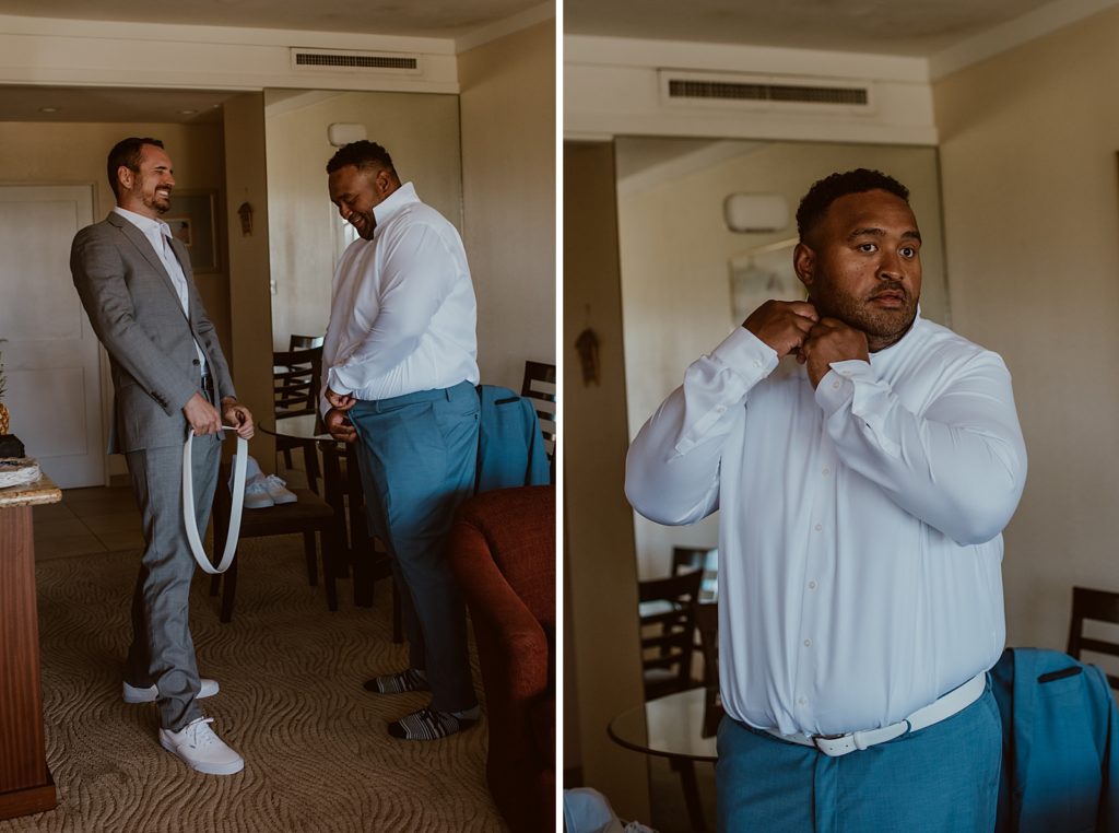 Groom getting ready adjusting pants and shirt