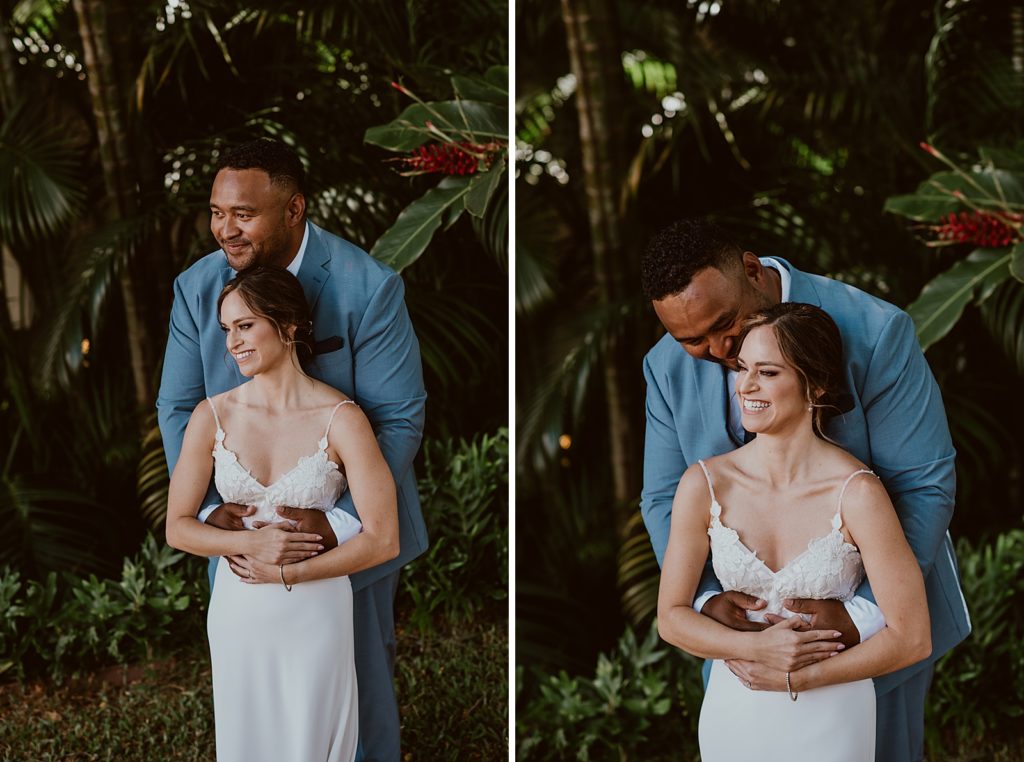 Groom holding Bride from behind