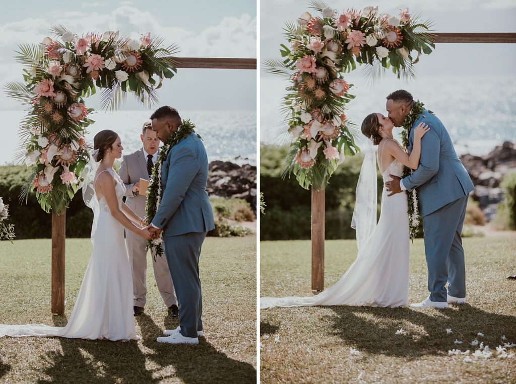 Just married Bride and Groom kissing at the alter