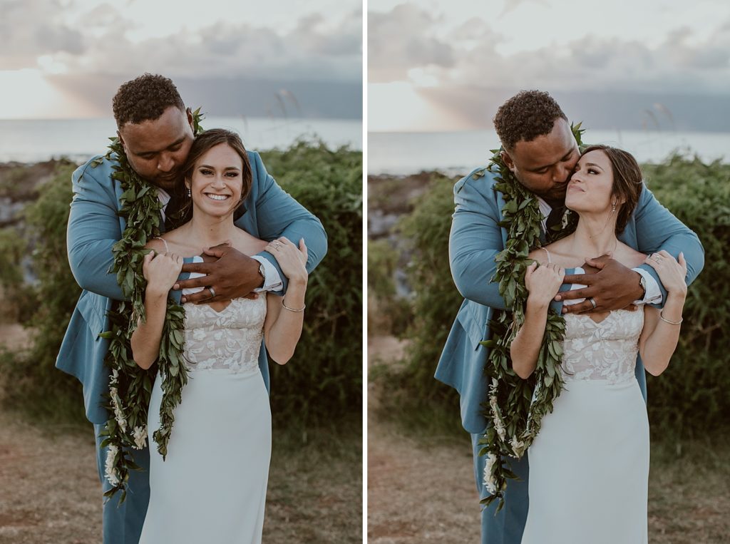 Groom nuzzling and holding Bride fro behind