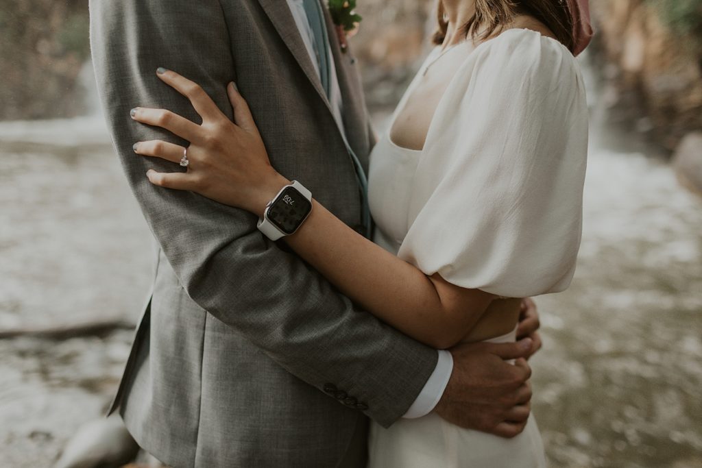 Closeup of Bride and Groom holding each other