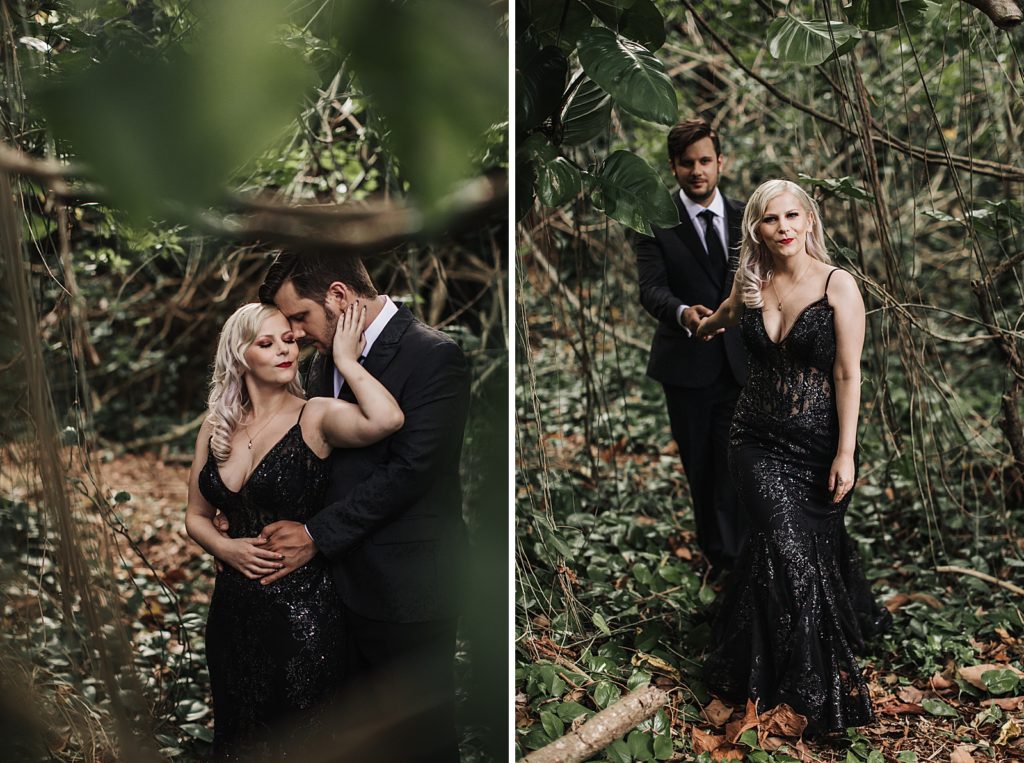 Bride and Groom holding each other surrounded by vines