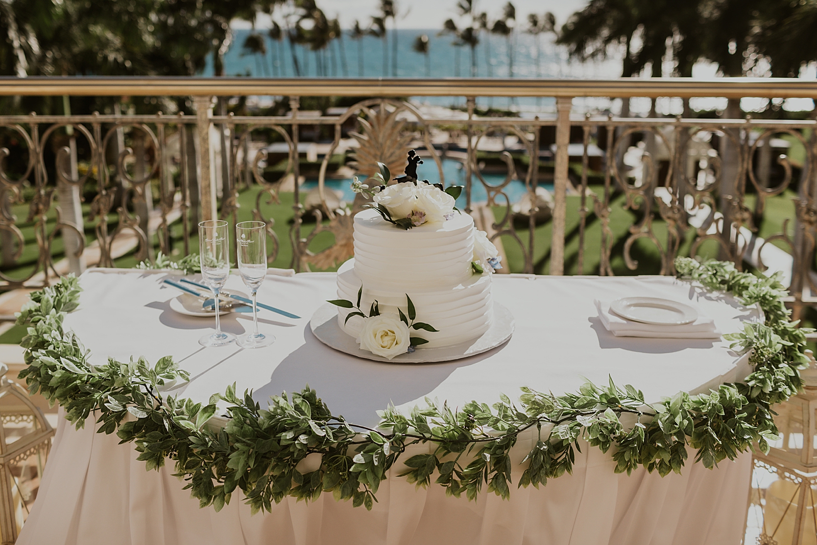 Detail shot of wedding cake table with champaign glasses
