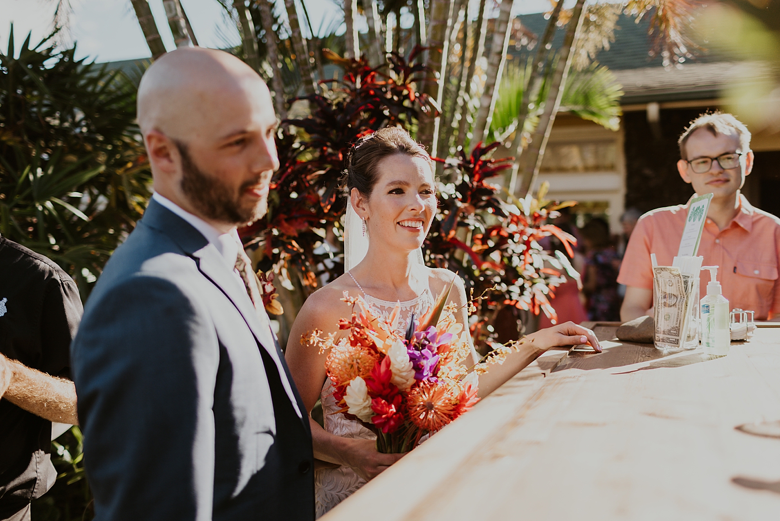 Bride and Groom at bar getting drinks
